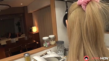 A Japanese homemaker enjoys oral pleasure in the kitchen without censors